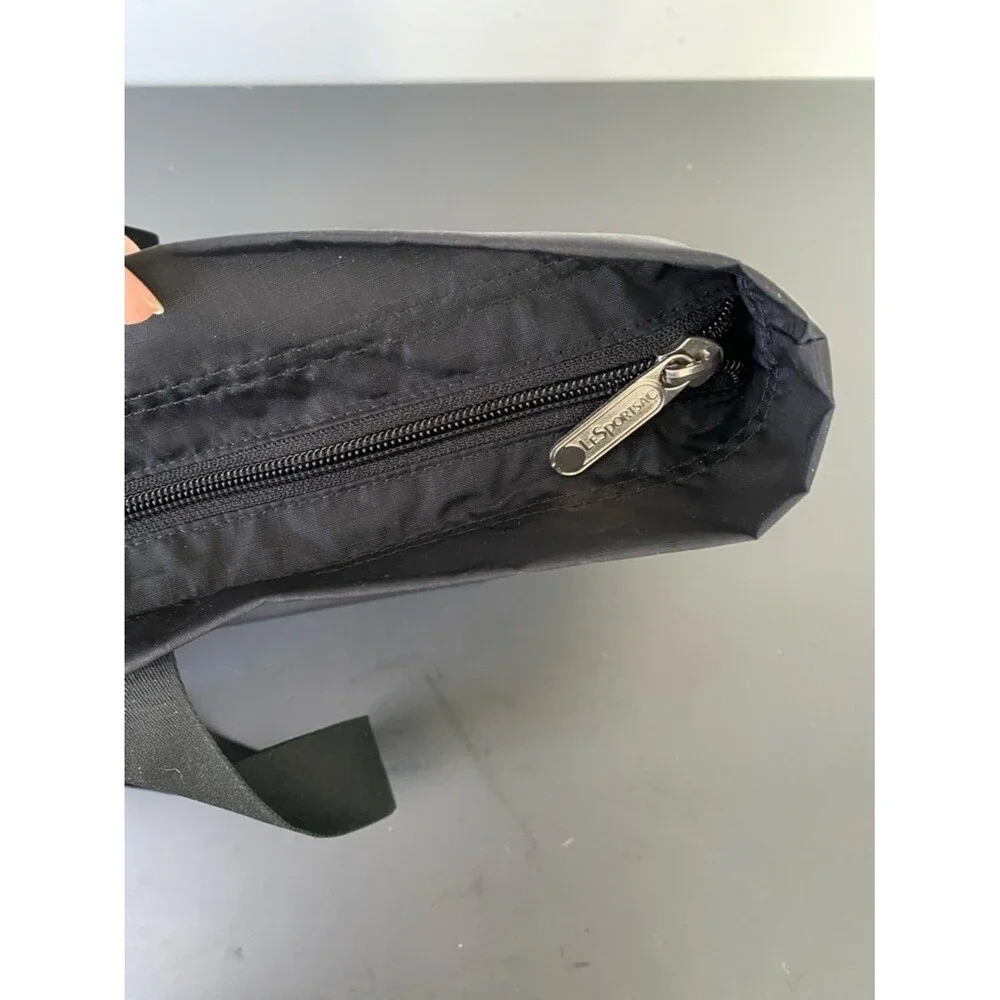 Lesportsac handles suit